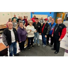 Flaming Pistons Car Club presenting Clarkston Fueling Kids Futures with check